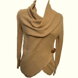 Unique and fun tan knit sweater with leather accent. Venus brand.
